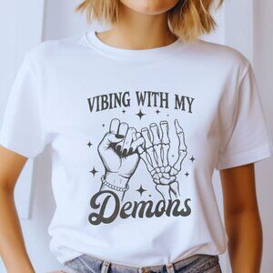 Vibin with Demons Funny Halloween Graphic Tee Dark Humor Spooky Goth Whimsi Top